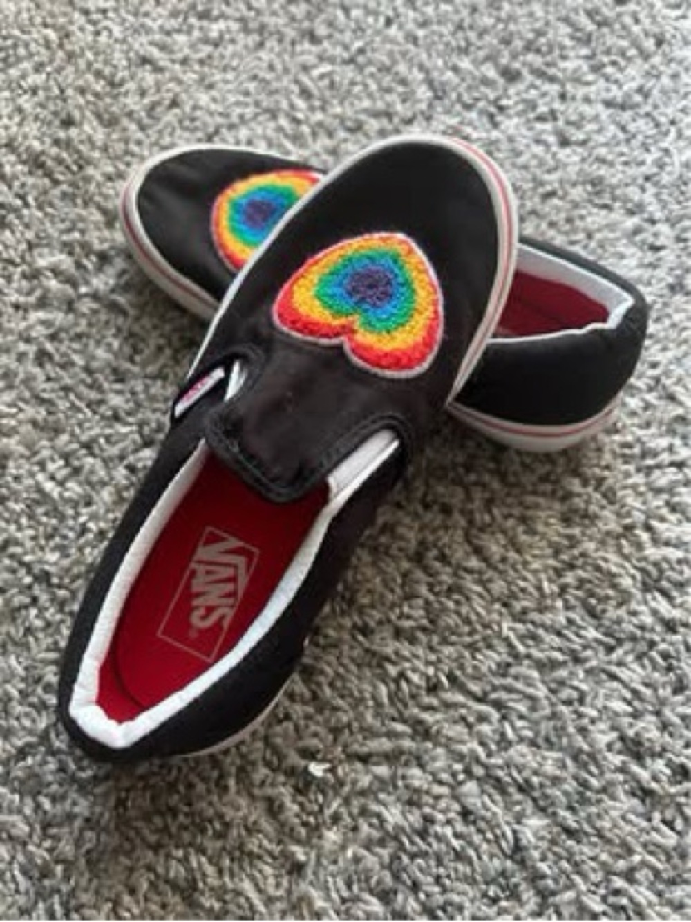 Vans Kids Black Slip-On Sneakers with Rainbow Heart Patch